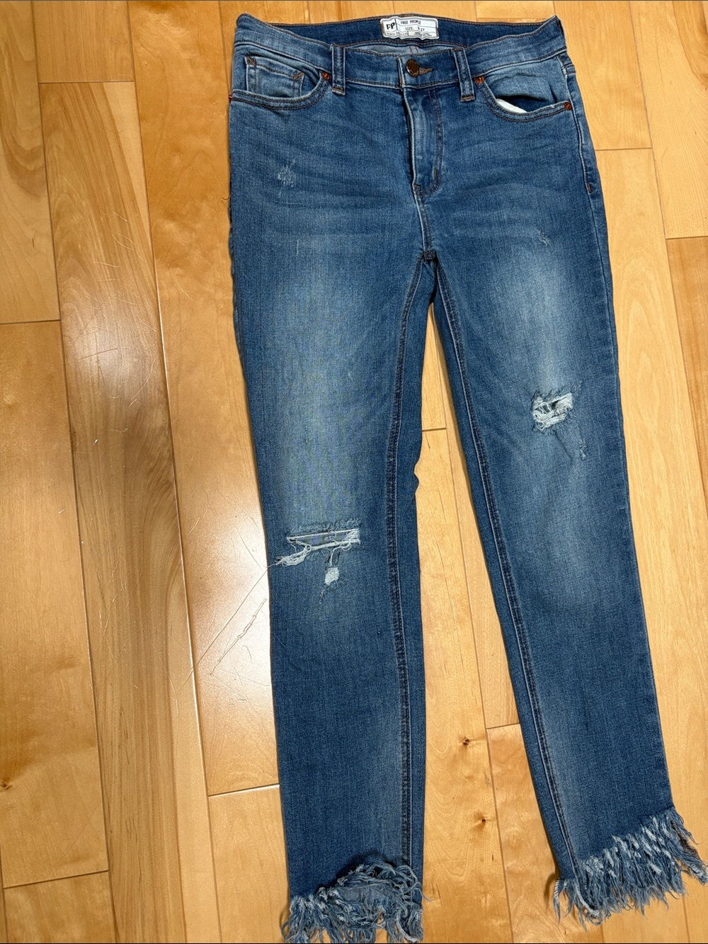 Free People Distressed Blue Women's Slim Jeans with Frayed Hem, size 27